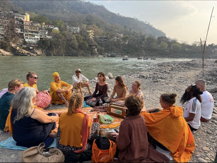 Kirtan beside the sacred river