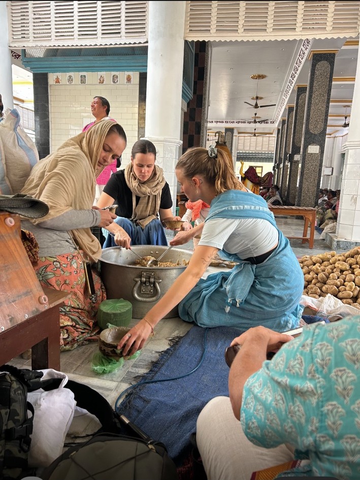 Travellers participating in sacred service